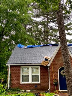 Completed asphalt shingle roof replacement by MCI Roofing
